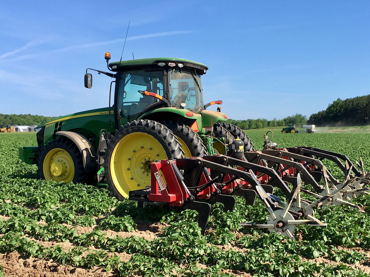 Sandyland tractor tilling their field