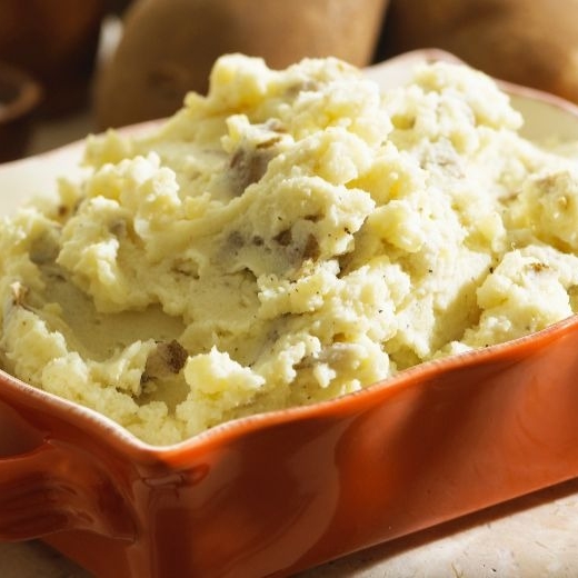 Positively Perfect Mashed Potatoes in casserole dish